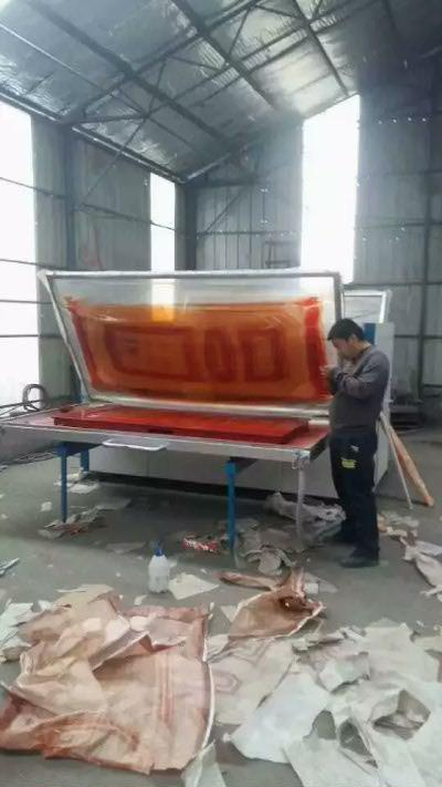 內(nèi)蒙古木紋轉(zhuǎn)印機，轉(zhuǎn)印紙自動脫落。